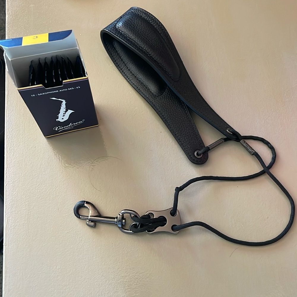 Leather saxophone neck strap & 8 - #3 Reeds